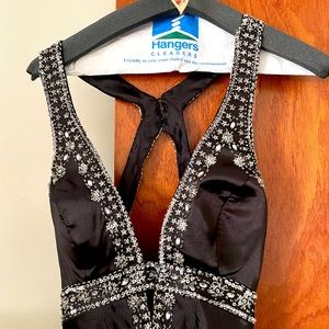 Dave/Johnny embellished and plunging neckline and back out Prom Gown. Size 3/4